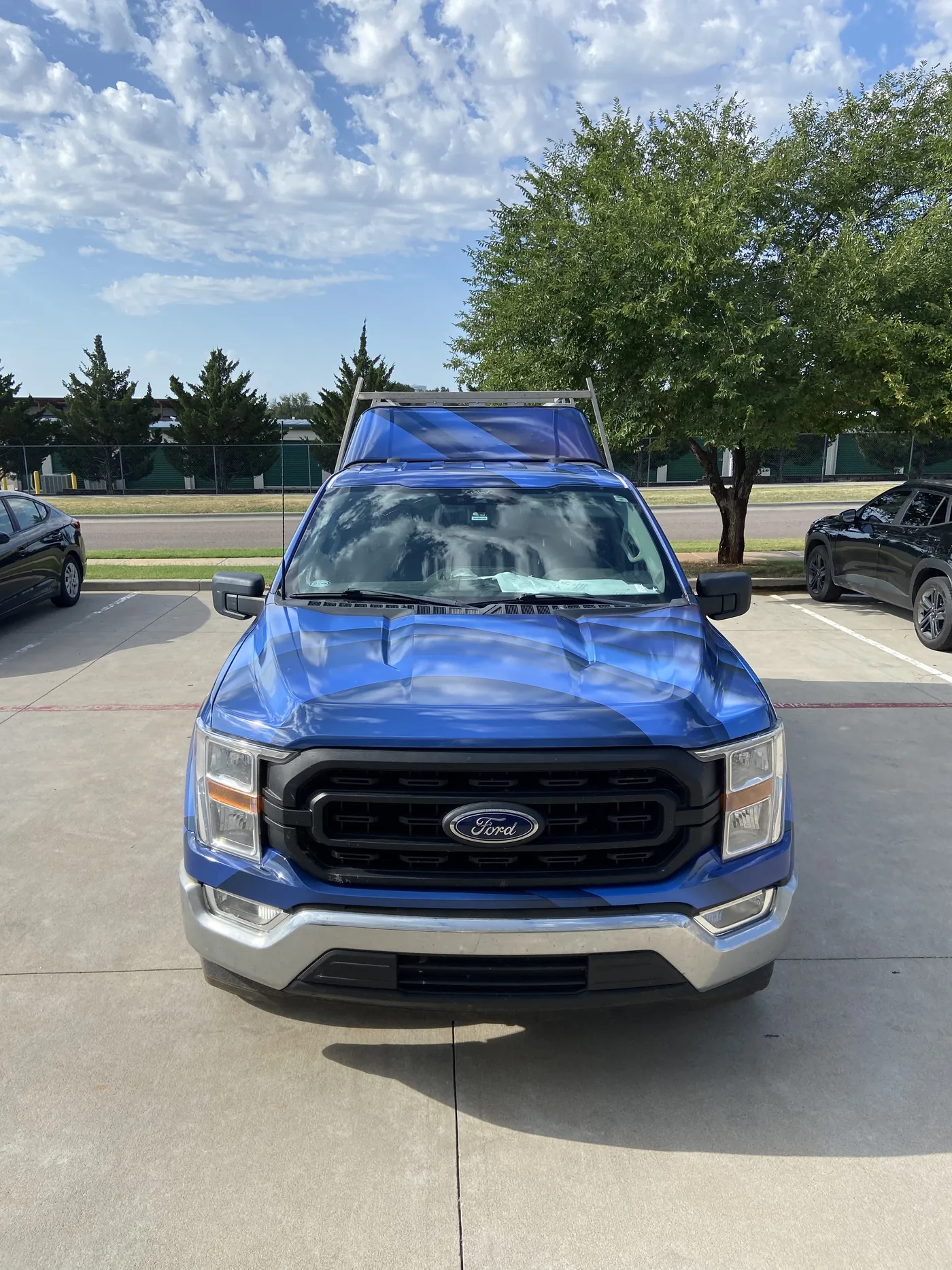 Front of the ASAP Ford F-150 with the blue wrap carried across the hood