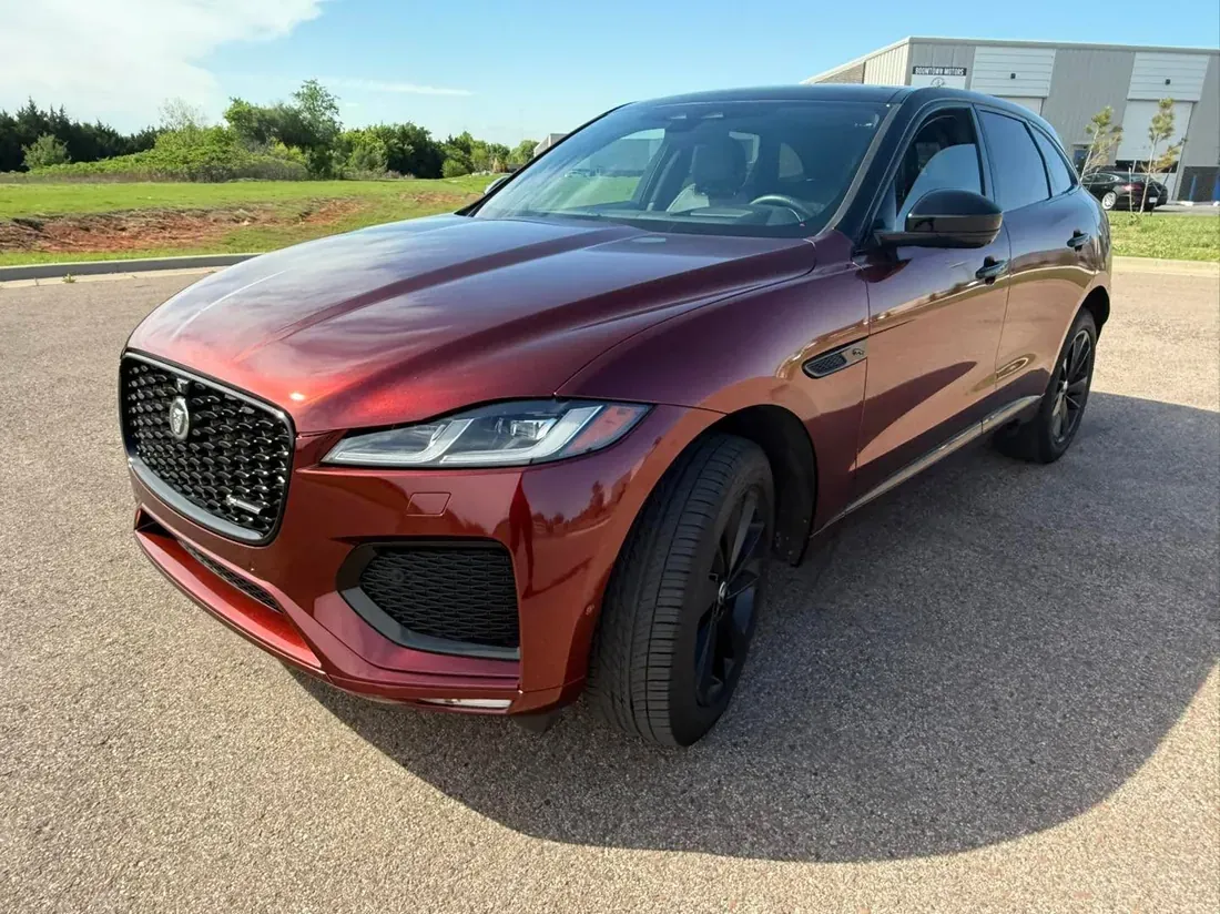 Jaguar F-Pace in a red-black iridescent color change wrap